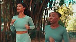 Women, running friends and training in park with teamwork, together or support for speed in summer. Woman, fast runner and fitness with focus, team building or development in nature for wellness goal