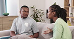 Mad, argument and fight with black couple on sofa for divorce, breakup and conflict. Crisis, problems and frustrated with man and woman in living room of home for depression, toxic and anger