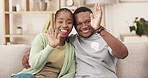 Waving, greeting and black couple face for video call and thumbs up for online welcome. Hug, love and woman with man together at home on a living room couch with happiness on web conversation