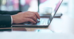 Businessman, hands and laptop typing email, proposal or communication at the office desk. Hand of man employee working on computer in strategy, schedule planning or networking at the workplace