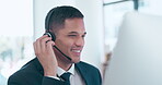 Businessman, call center and face consulting with headphones on computer in customer service or support. Happy man consultant or agent talking on headset in contact us for online advice at the office