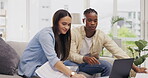 Laptop, couple talking and documents for finance, taxes or savings on sofa in home. Interracial, paperwork and black man and woman with computer for planning budget, insurance or financial bills.