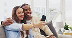 Tongue out, selfie and couple kiss in home on sofa and take profile picture for happy memory. Funny, interracial and black man and woman taking photo, kissing cheek and bonding for social media.