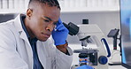 Science, microscope and stress with a doctor man in a laboratory feeling frustrated by his research results. Medical, anxiety and fail with an african male scientist working in a lab for innovation