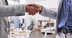 Closeup, recruitment or business people with a handshake in job interview for negotiations in office meeting. Partnership, b2b collaboration or corporate women shaking hands in hr contract agreement 