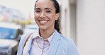 Happy, face and a woman in a windy city, smiling and looking cheerful for work. Smile, beautiful and portrait of a young girl in town for corporate career, laughing and standing in an urban area