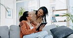 Lesbian women, tablet and home sofa together to relax or surfing internet while talking and happy. Gay couple with mobile app for streaming movies or video on social media living room couch with love