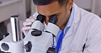 Man, medical science and a microscope in a laboratory for analysis or healthcare research. Male scientist in a lab for development, study and working on future innovation with sample for test