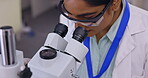 Medical science, woman and a microscope in a laboratory for analysis or healthcare research. Female scientist in a lab for development, study and working on future innovation with sample for test