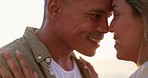 Love, beach hug and couple face closeup by the sea with happiness and sunset for engagement announcement. Ocean, date and happy people together with a loving and relax embrace with commitment outdoor