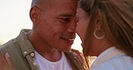 Love, beach smile and couple face closeup by the sea with happiness and sunset for summer travel. Ocean, date and happy people together with a loving and relax embrace with commitment outdoor