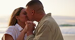 Dance, love and kiss with couple on beach for romance, summer vacation and celebration. Bonding, affectionate and happiness with man and pregnant woman for holiday, holding hands and support