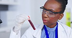 Blood test, science and black woman with research analysis, vaccine and healthcare check in laboratory investigation. Professional person, doctor or medical scientist with red tube or dna liquid