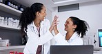 Teamwork, high five and women scientists on laptop after research innovation in laboratory. Science, collaboration and happy doctors with applause to celebrate achievement or medical breakthrough.