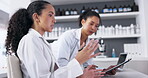 Collaboration, science discussion and a doctor woman at work in a laboratory with a colleague. Teamwork, research or innovation with a scientist and partner working together in a lab for analysis