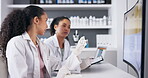 Collaboration, science on a computer and a doctor woman at work in a laboratory with a colleague. Teamwork, research or innovation with a scientist and partner working together in a lab for analysis