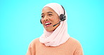 Call center, talking and woman isolated on blue background agent, consultant or muslim telemarketing support. Happy telecom, global tech support or communication of hijab person speaking in studio