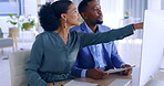 Business people, computer and collaboration with documents for finance, project or team planning at office. Businessman and woman discussing paperwork, corporate budget or idea on PC at the workplace