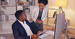 Teamwork, documents and business people in office planning for project deadline, proposal or report at night on computer. Review, feedback and black woman talking to partner or manager for paperwork