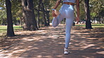 Back, stretching legs and woman at park for health, wellness and exercise for fitness. Sports, stretch and Indian athlete or person warm up or get ready to start workout, cardio or running outdoor.