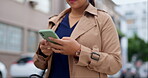 Cellphone, hands typing and walking in city, social media and text messaging outdoor. Phone, professional and business woman in urban street, networking and online scrolling, travel and web browsing.