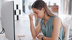 Business woman, headache and stress on computer in burnout, tired or strain at office desk. Exhausted and stressed female employee suffering from bad head pain, ache or migraine by PC at workplace