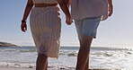 Walking, relax and holding hands with couple at beach for travel, love and summer vacation. Happy, relationship and romance with man and woman on date for bonding, affectionate and commitment