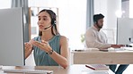 Business woman, call center and consulting on computer for customer service, telemarketing or support at office. Female consultant or agent talking and explaining with headphones in contact us on PC