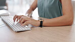 Business woman, hands and typing on computer keyboard for email, communication or research on office desk. Hand of female employee working on desktop PC for proposal, networking or corporate search