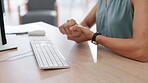 Business woman, hands and wrist pain from typing email, communication or research on computer at office desk. Hand of female employee suffering from arm ache or carpal tunnel syndrome on desktop PC