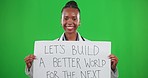 Happy, doctor and a black woman with a sign on a green screen isolated on a studio background. Smile, medical and an African healthcare worker showing and holding a poster with a message on backdrop