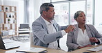 Teamwork, computer and laptop with business people in an office, working together on an email or report. Collaboration, management and assistance with a man employee helping a woman colleague at work