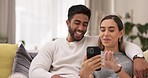 Phone, relax and couple on sofa in home for bonding, quality time and happiness in living room. Interracial relationship, love and man and woman on smartphone for social media, internet and website