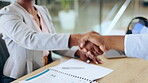 Handshake, meeting and interview with business people in the office for an agreement, deal or partnership. Collaboration, teamwork or contract with an employee and colleague shaking hands at work