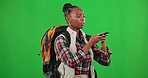 Phone gps, green screen or black woman tourist searching for a location on digital map with studio background. Traveling compass, lost directions or confused African girl hiking on adventure journey