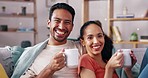 Coffee, relax and couple watching tv on a sofa, happy and laughing in their home together. Tea, television and man with woman in a living room for movie, streaming or subscription service on weekend