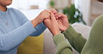Couple, people and holding hands for support, love and care of trust together in romantic relationship. Closeup of man, woman and helping hand of life partner, loyalty and commitment of hope at home