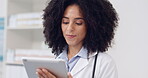 Medical, doctor and tablet with woman in hospital for research, website or digital results. Healthcare, medicine and technology with female reading information for test report, internet or connection