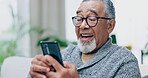 Relax, phone and smile with old man on sofa for text message, social media and streaming. Technology, happy and communication with senior male in living room at home for website, chat and internet