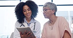 Healthcare, tablet and a woman talking to a patient during consulting with a doctor for insurance. Medical, trust and diagnosis with a female medicine professional explaining treatment to a senior