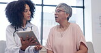 Medical, tablet and a woman talking to a patient during consulting with a doctor for insurance. Healthcare, trust and diagnosis with a female medicine professional explaining treatment to a senior