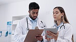 Teamwork, tablet or doctors writing for planning a surgery strategy in collaboration together in an office. Medical healthcare nurses reading online cardiology news report, feedback or research data