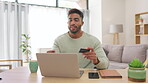 Laptop, credit card and ecommerce with a man cheering in his home while online shopping for a sale or deal. Computer, payment or celebration with a handsome young male customer searching for products