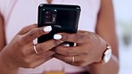 Business woman, hands and phone typing for social media, communication or browsing at the office. Closeup of female employee hand chatting, texting or research on mobile smartphone app at workplace