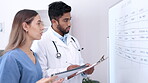Teamwork, doctor or nurse with research on board in hospital for medical help or communication. Woman, man or healthcare people in clinic for planning a report, analysis or conversation together