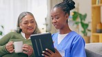 Nurse, caretaker and elderly woman with tablet and communication for teaching about tech. Retirement home, healthcare worker and nursing employee talking to senior female about an online app on sofa