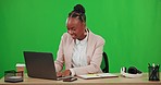 Planning, happy and a black woman with a laptop on a green screen isolated on a studio background. Workspace, smile and an African employee typing on a pc and writing in a notebook for a plan