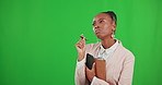 Thinking, phone and a business woman on a green screen background in studio to remember an appointment. Idea, mobile and contact with a young african american female checking her schedule or calendar