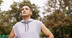 Breathing, exercise and man runner in a park for fitness, break and morning cardio outdoors. Sports, workout and indian male relax in a forest after running, training or workout run in Mexico