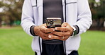 man, hands and phone outdoor for communication with network connection for a chat in nature. Male model person with a smartphone in hand for social media, research or typing message on app at park